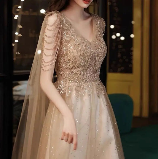 2022 Champagne Gold Evening Dresses With Cape A Line Sexy V-neck A-line Shiny Luxury Beading Shawl Formal Celebrity Prom Gowns